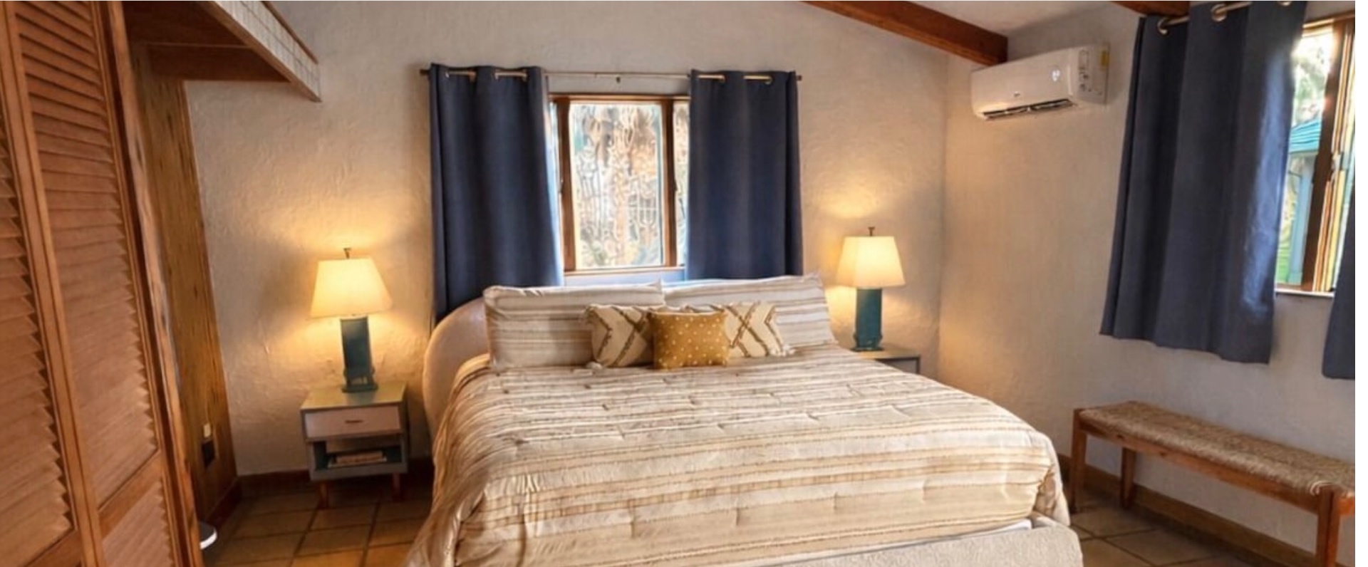 Queen Bedroom — Blackout curtains, premium linens, mini-split A/C